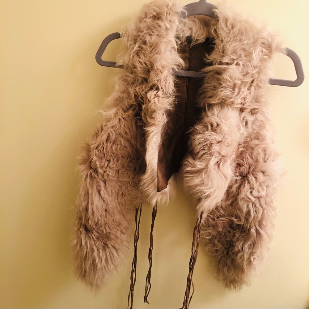 Genuine sherling vest. Super cute. Two sides wear